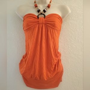 Halter blouse with bead embellishments.
